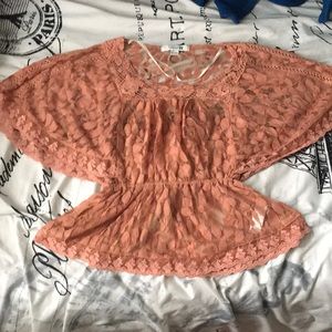 I am selling a lacy peach blouse from forever 21